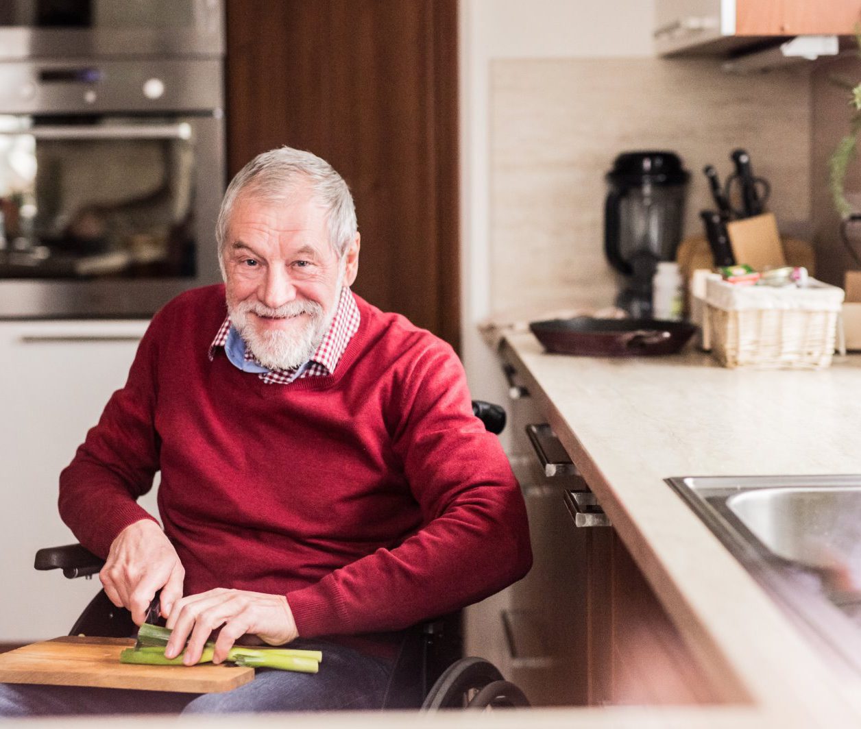 elderly senior living at home cooking independently